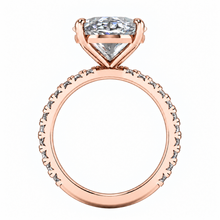 Load image into Gallery viewer, Rose gold solitaire engagement ring with a radiant-cut clear center stone and a shank paved with small round stones, shown on a plain white background.