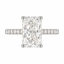 Load image into Gallery viewer, A radiant cut diamond engagement ring with a pavé-set diamond band in a silver-colored metal, shown on a plain white background.