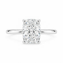 Load image into Gallery viewer, An cushion-cut diamond engagement ring with a polished silver-colored band, shown against a plain white background.
