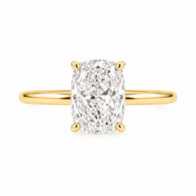 Load image into Gallery viewer, A cushion-cut diamond engagement ring with a yellow gold band, set against a plain white background.
