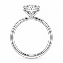 Load image into Gallery viewer, A classic solitaire engagement ring featuring a pear-cut diamond set in a polished six-prong silver-colored band, shown against a plain white background.
