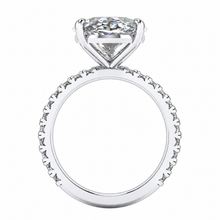 Load image into Gallery viewer, A silver-toned solitaire engagement ring featuring a large radiant brilliant-cut diamond center stone and a shank paved with small round diamonds, shown on a plain white background.
