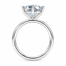 Load image into Gallery viewer, A silver solitaire engagement ring featuring a round brilliant-cut clear gemstone in a six-prong setting, shown against a plain white background.
